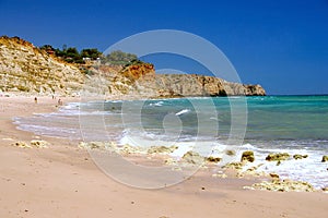 Beach with porto de Mos, Algarve Portugal photo