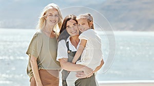 Beach, portrait and girl with her grandmother and mother on vacation, adventure or holiday. Happy, smile and family