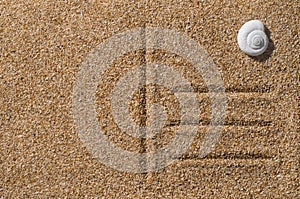 Beach postcard on sand