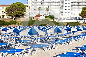 Beach resort and hotel with sun loungers on the sand