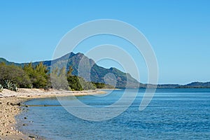 Beach of Riviere Noire with Le Morne peninsula, West Coast, Mauritius