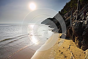 Beach rock mountain and sea