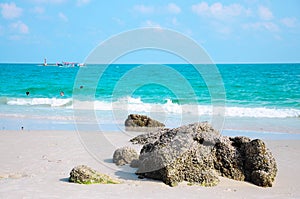 Beach rock white sand beach and blue sky