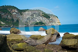 Beach rocks hit by waves