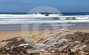 Beach with rocks in the sand