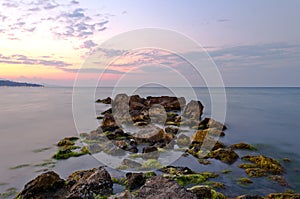 Beach rocks at sunset