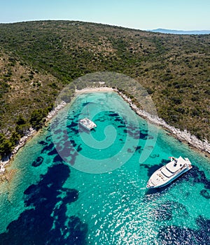 Beach rocky coast of Croatia island, Mediterranean sea national park. Yachting and sailing tourist holiday.