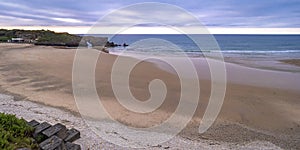 Beach of San AntolÃÂ­n, Naves, Spain photo