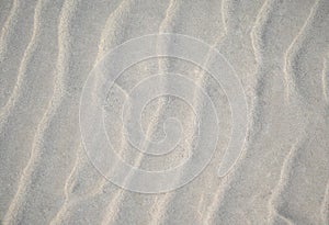 beach sand background with natural wave pattern by nature