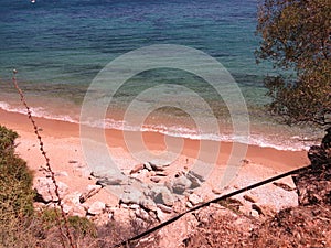 Beach sand and beautiful blue sea view. Natural living. Pelion peninsula. Pagasetic gulf. Platanias village. Greece.