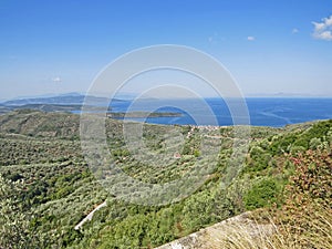 Beach sand and beautiful blue sea view. Natural living. Pelion peninsula. Pagasetic gulf. Platanias village. Greece.