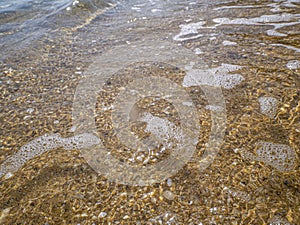 Beach sand and beautiful blue sea view. Natural living. Pelion peninsula. Pagasetic gulf. Platanias village. Greece.