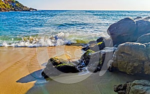 Beach sand blue water huge surfer waves Carrizalillo Puerto Escondido