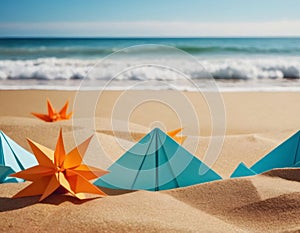 A beach on the sand with paper origami of starfish and boats