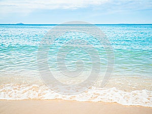 Beach Sand on Sea Background,Shore Summer with White Wave and Blue Ocean Beautiful Seascape Nature for Tourism Vacation Travle