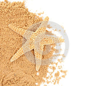 Beach sand and sea star on white background, top view