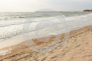 Beach sand and sea waves