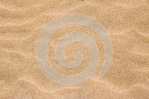 Beach sand texture background in summertime