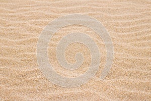 Beach sand texture background in summertime