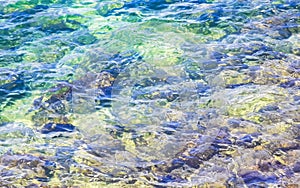 Beach sand blue turquoise water waves rocks panorama Puerto Escondido photo