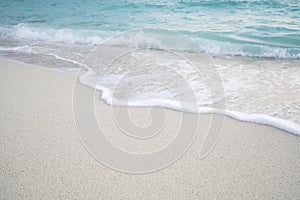 Beach and sand with water wave. Nature background.