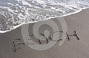 Beach sand writing