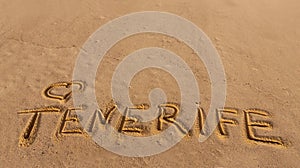 Beach sand with written word Tenerife