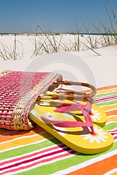 Beach sandals on sand