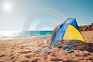 Beach scene with a beach tent