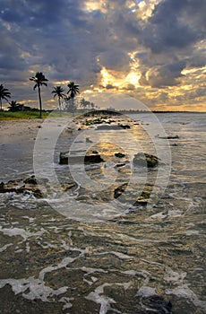 Beach scene with dramatic sunset, cuba