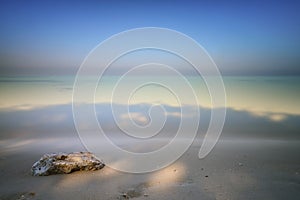 Beach scene showing sand, sea and sky