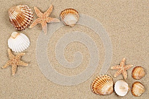 Beach scene in summer cacation with sand, sea shells, stars and