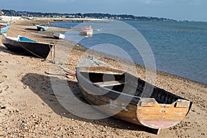 Some rowing boats on the beach near Poole Harbour in the United Kingdom