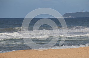 Beach and Sea at Durban with Bluff in Background