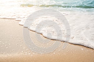 beach with sea shell and wave foam.bubble wave swashing under the morning light