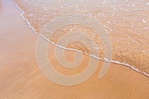 The beach and sea surface with Deep Blue sea clear sky clouds. Landscape with Ocean small waves water reflection copy space for