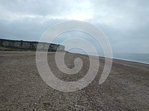 Beach sea water Clif sand pebble