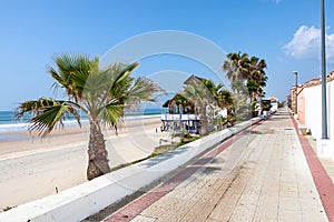 Beach seafront promenade with Spanish chiringuito photo