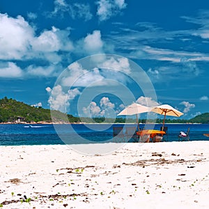 Beach at Seychelles with picnic table and chairs