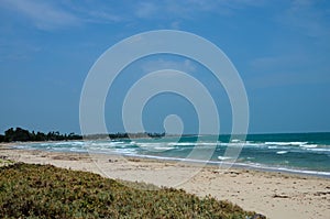 Beach shoreline with surf sand waves in Jaffna peninsula Sri Lanka