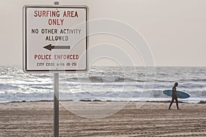 Beach Sign at Virginia Beach Oceanfront With surfer