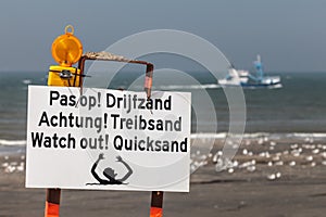 Beach sign warning for quicksand