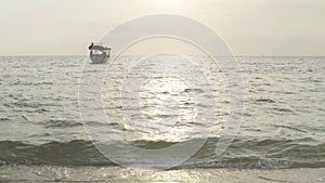 Beach in Sihanoukville, Cambodia, Asia. Boat at sea near the shore