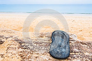 Beach slippers on a sandy beach in Phuket, Thailand