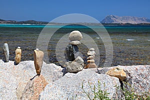 Beach stone cairns in Sardinia, Italy