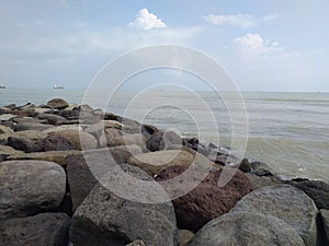 Beach and stone Pantai Alam Indah photo