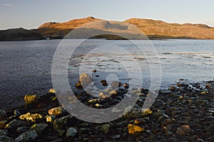 Beach with stones in Mavis Grind, Shetland Islands