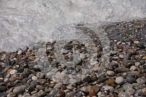 Beach stones waves close-up holidays .hot summer
