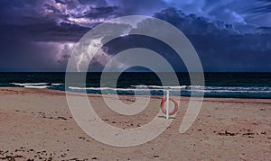 beach during the storm with lightning