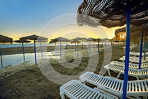 Beach after storm near Benalmadena at sunset. Andalusia, Spain photo